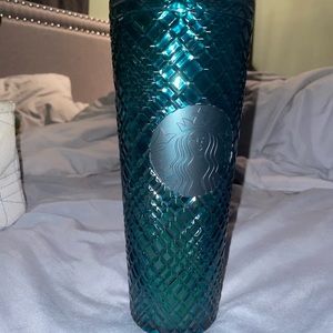 Green venti Starbucks cup